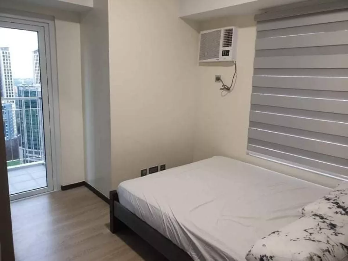 "Fully Furnished 2-Bedroom Unit in The Trion Towers, Taguig City For Lease"08