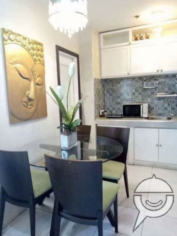 Fully furnished and stylish condo beside GMA MRT09