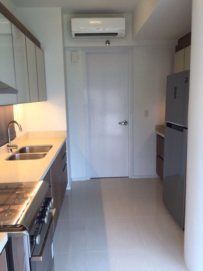 "JD 001 for lease 2BR fully furnished in Arya Residences, BGC for 150,000"08
