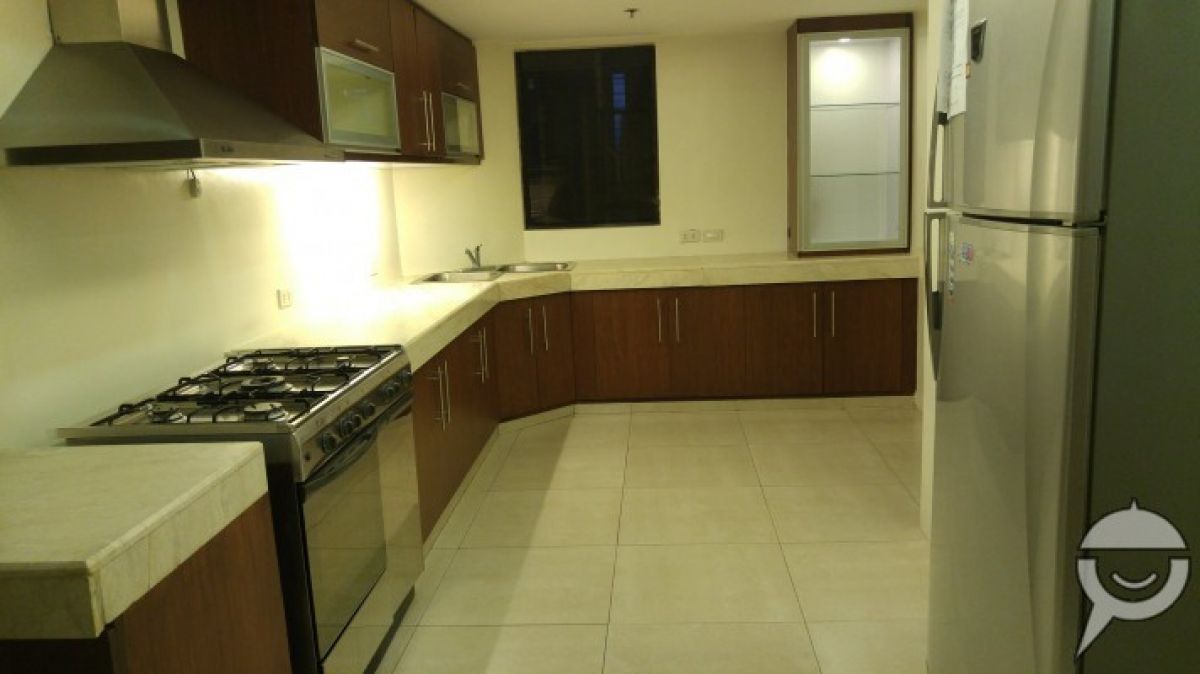 Semi-Furnished 4BR Newly Renovated Condo on Ayala Ave04