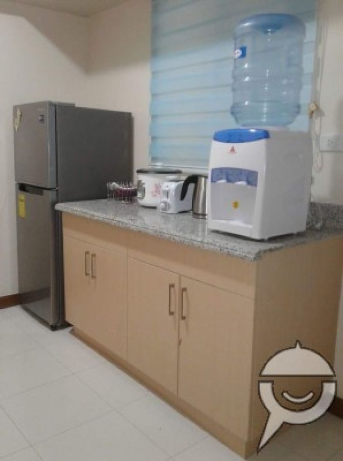 "2 BR. Condo in Quezon , City"02