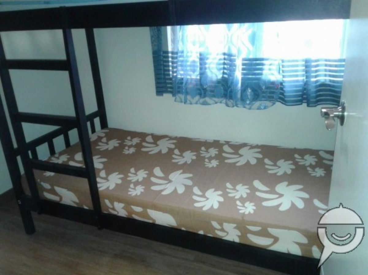 "2 BR. Condo in Quezon , City"03