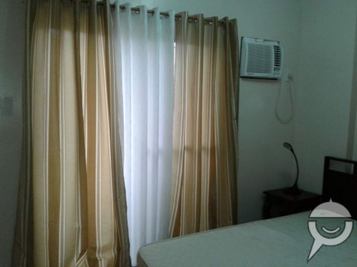 "2 BR. Condo in Quezon , City"04