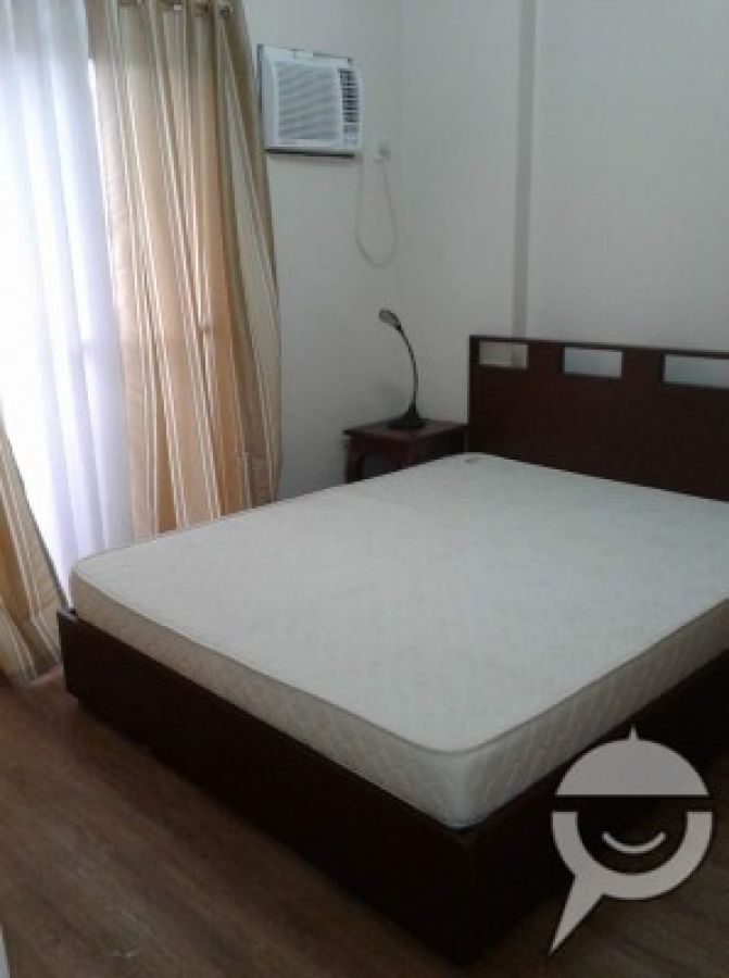 "2 BR. Condo in Quezon , City"05