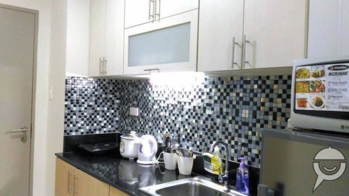 Cozy Condo at Wind Residences07