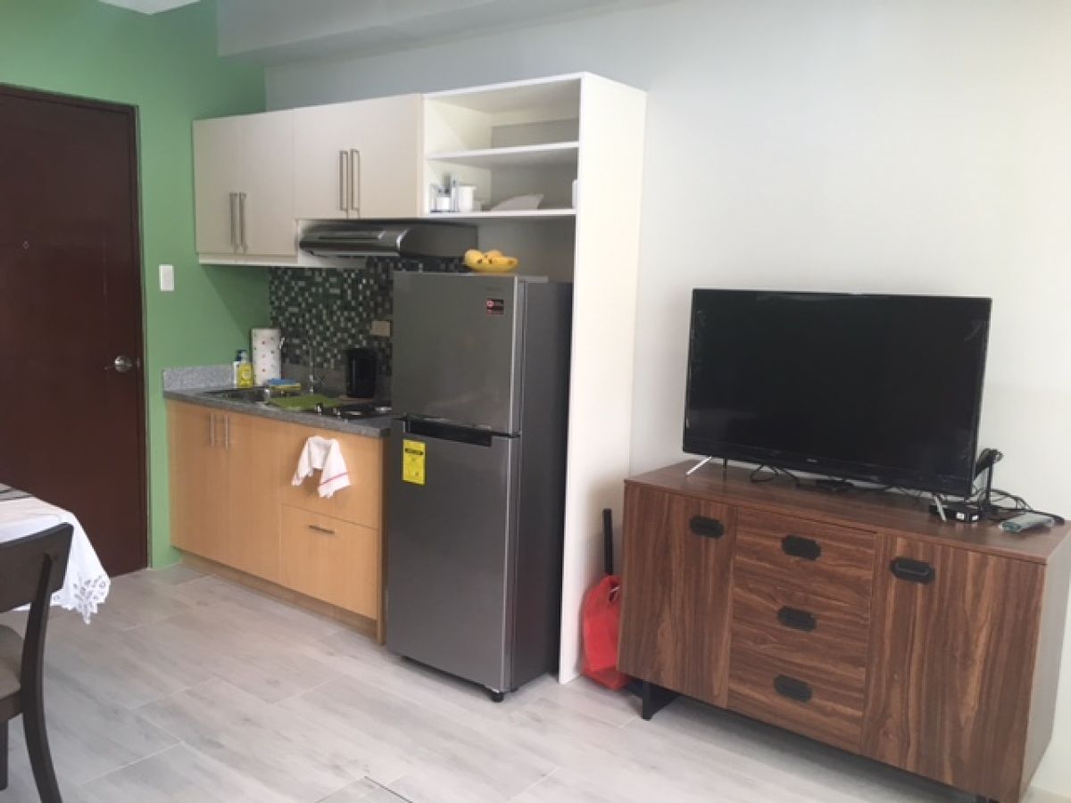 "Brand New, Nice Interior, Spacious 1-Bedroom Furnished Condo on Top Floor"04