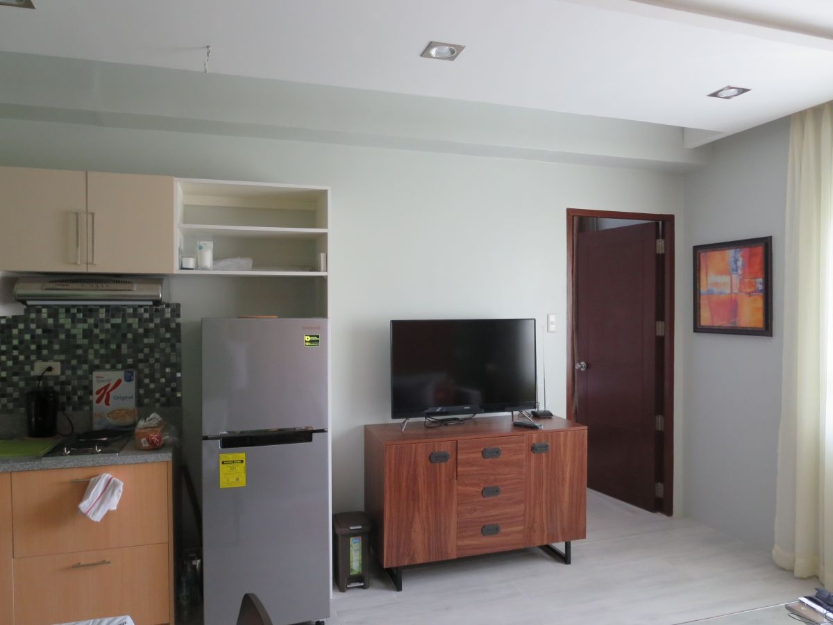 "Brand New, Nice Interior, Spacious 1-Bedroom Furnished Condo on Top Floor"06