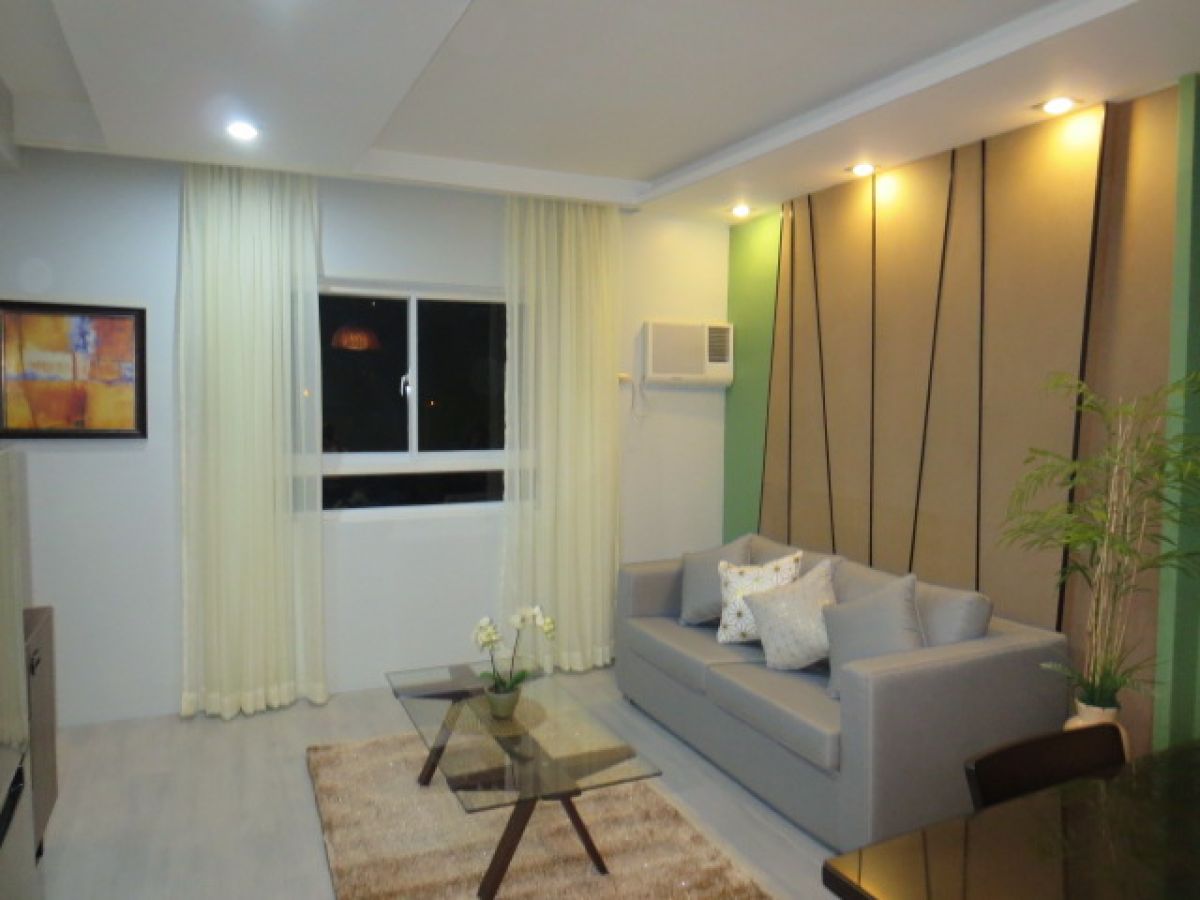 "Brand New, Nice Interior, Spacious 1-Bedroom Furnished Condo on Top Floor"07