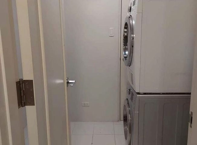 Brand new unit in The Beaufort BGC! Rare golf course view02