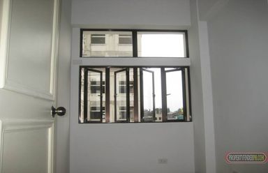 "2-Bedroom flat-type condo unit (30 sqm), with 1 T&amp;B and window gri"02