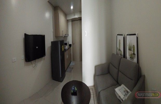 1BR with Balcony. Semi furnished.03