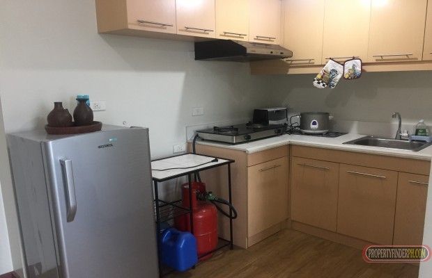 "For Rent 1BR 1TB condo unit, semi-furnished conveniently located near"03