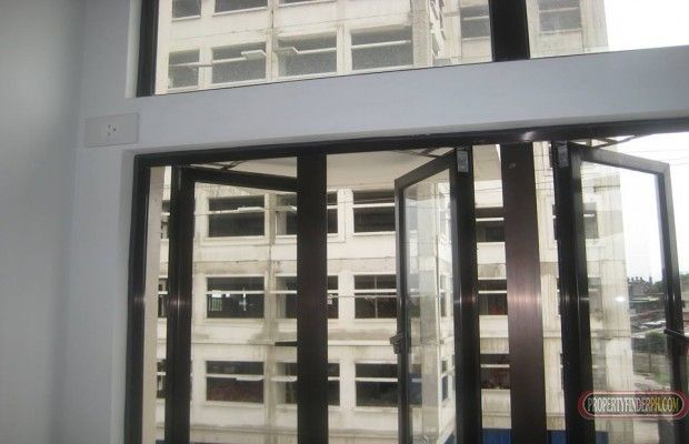 "2-Bedroom flat-type condo unit (30 sqm), with 1 T&amp;B and window gri"01