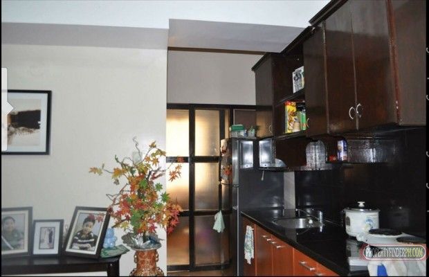 "Semi furnished condo AC, queen size bed frame, built in cabinet inclu"04