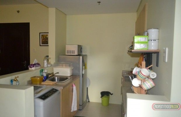 "A fully furnished,two bedroom condo unit with airconditioning ,cable a"03