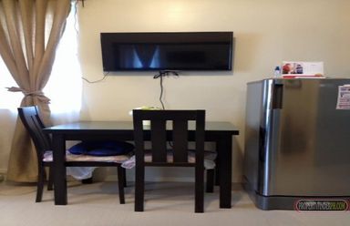 One bedroom fully furnish condo unit facing amenities with balcony. be02
