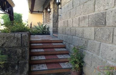 "Nestled in an exclusive subdivision in Alabang is this split-type, Fil"02