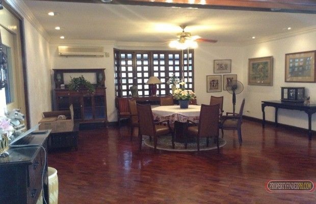 "Nestled in an exclusive subdivision in Alabang is this split-type, Fil"04