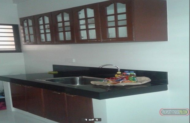 "A Two Storey Apartment built last year.  It consists of 2 bedrooms, 1"03