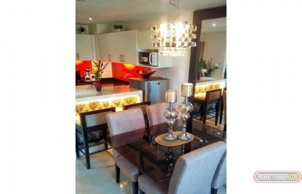 "Hotel-like, fully-furnished 2BR Corner Unit Condo in Gilmore, QC"03