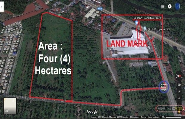 A Four (4) hectare commercial Lot for rent with fully concrete fence.01