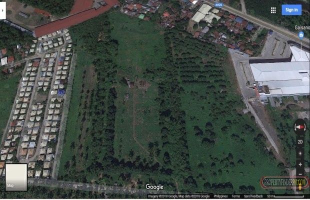 A Four (4) hectare commercial Lot for rent with fully concrete fence.03