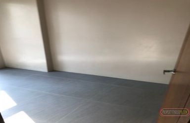 A Cozy 1 bedroom Condominium with balcony in front of pool. 15-20 min02