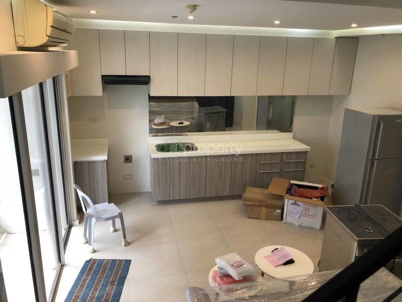 "Condominium For Rent in W Tower, Taguig City."04