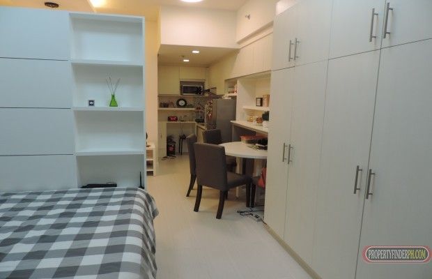 "FULLY FURNISHED PREMIUM STUDIO UNIT, with AC and swimming pool , gym a"04