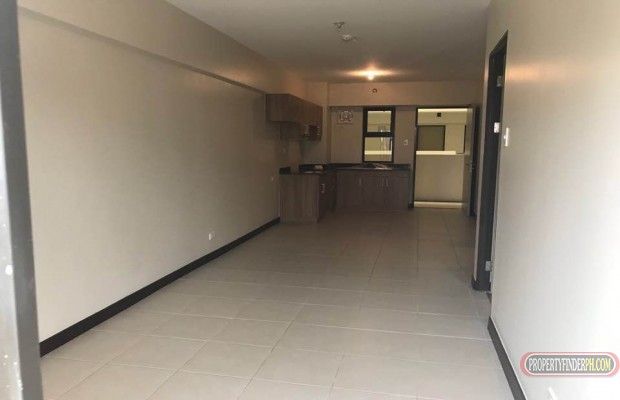 Bare 2 bedroom unit facing amenities with washing/drying area03