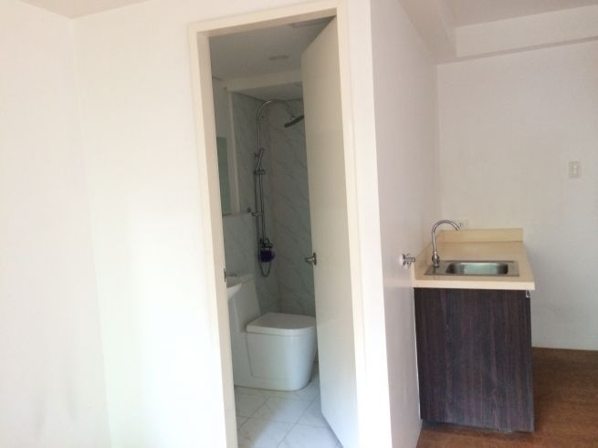 Unfurnished Studio Premiere with Balcony near UP Diliman03