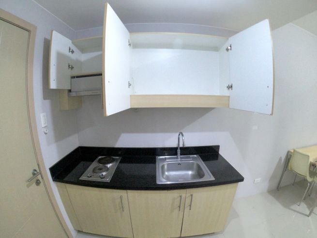 Semi-furnished 1 Bedroom Unit at Grass Residences Quezon City03