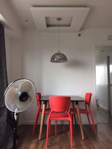 "Modern 1-bedroom unit in Morgan Suites Executive Residences, Mckinley"03