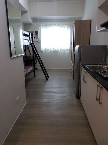 "Fully Furnished condo unit opposite Ateneo, Mirriam and UP Diliman"04