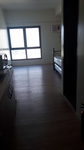 Fully furnished 24 sqm studio condo unit near EDSA MRT TRINOMA03